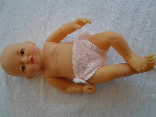 soft rubber doll with a nappy on