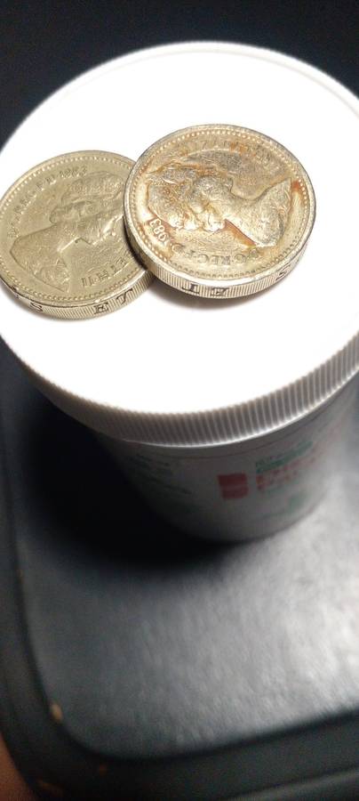 1983 British one pound coin.ERROR : See lettering upside down on the Rim of the coin