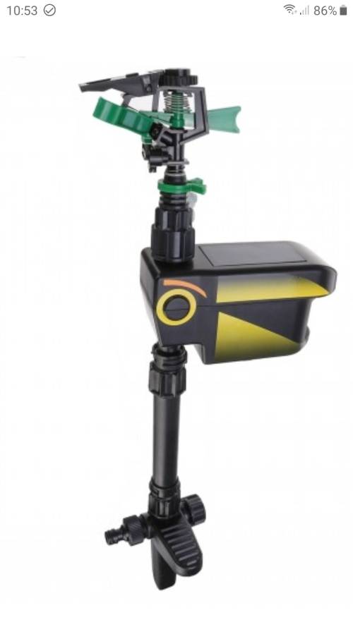 Solar powered motion activated animal deterrent sprinkler