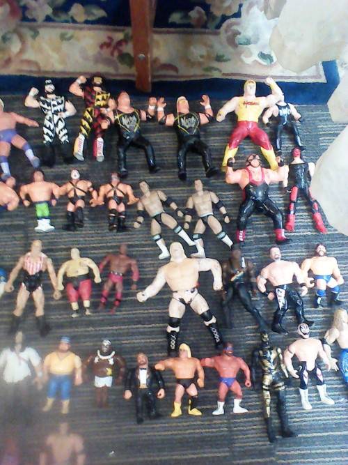 COLLECTORS LOT OF 62 WWF/WWE WRESTLING FIGURES