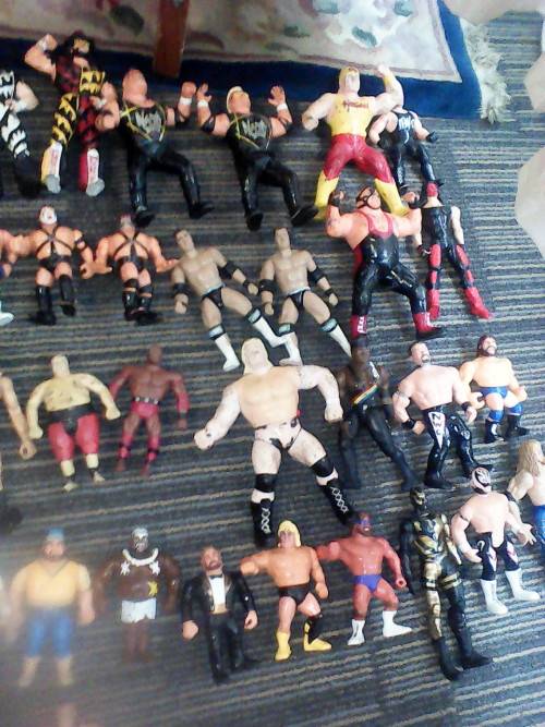 COLLECTORS LOT OF 62 WWF/WWE WRESTLING FIGURES