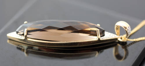 UNUSUAL MARQUISE SHAPED SMOKY QUARTZ AND DIAMOND 9CT ITALIAN GOLD PENDANT ON 43CM CHAIN. CLASSY.