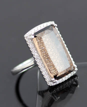 UNUSUAL RECTANGULAR SMOKY QUARTZ STERLING SILVER RING ON VISIBLE BED OF PAVE CRYSTALS