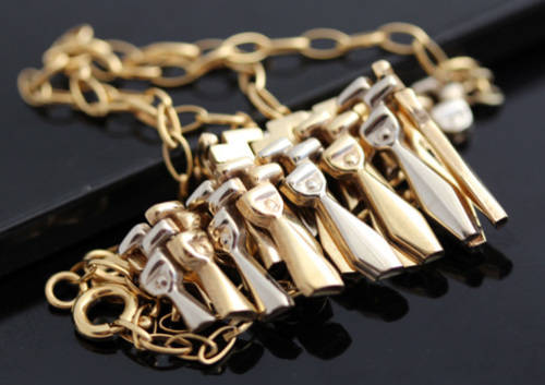 VINTAGE ENGLISH 9CT YELLOW AND WHITE GOLD FRINGE DESIGN PENDANT NECKLACE. 924