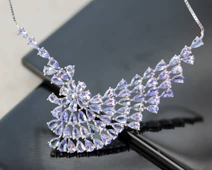 DRAMATIC AND ELEGANT REAL TANZANITE STERLING SILVER WAVE-LIKE RIGID FEATURE NECKLACE