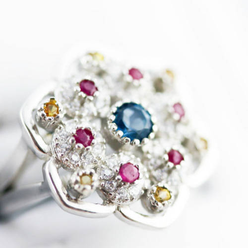 LONDON BLUE TOPAZ, NATURAL SONGEA SAPPHIRES and RUBY STERLING SILVER RING `TUDOR ROSE` DESIGN