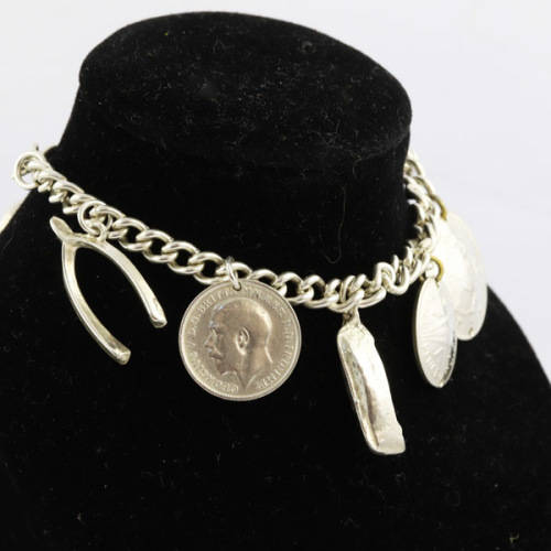 HEAVY VINTAGE HANDCRAFTED SOLID STERLING SILVER CHARM BRACELET WITH 7 CHARMS