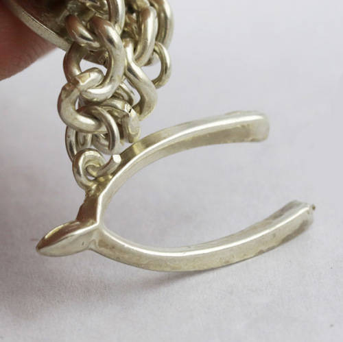 HEAVY VINTAGE HANDCRAFTED SOLID STERLING SILVER CHARM BRACELET WITH 7 CHARMS