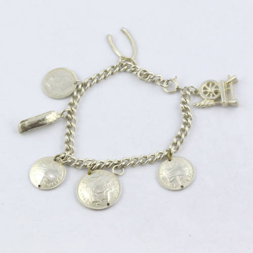 HEAVY VINTAGE HANDCRAFTED SOLID STERLING SILVER CHARM BRACELET WITH 7 CHARMS