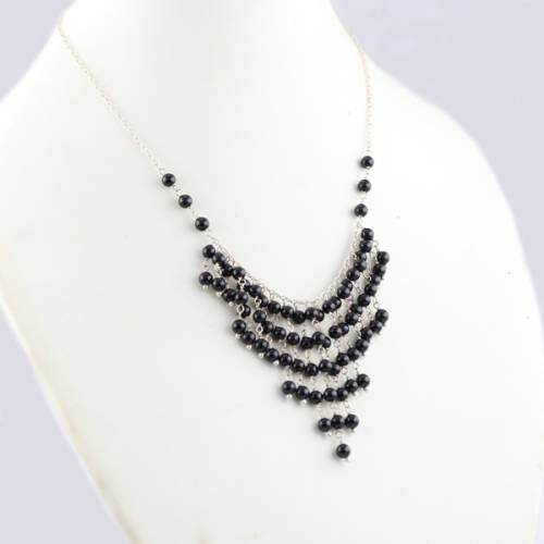 UNUSUAL STERLING SILVER FRINGE NECKLACE WITH A CASCADE OF 4MM ROUND BLACK SPINEL GEMSTONES. 925