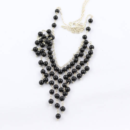 UNUSUAL STERLING SILVER FRINGE NECKLACE WITH A CASCADE OF 4MM ROUND BLACK SPINEL GEMSTONES. 925