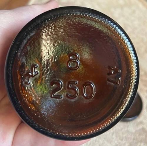 VINTAGE MEDICINE BOTTLE WITH GLASS STOPPER