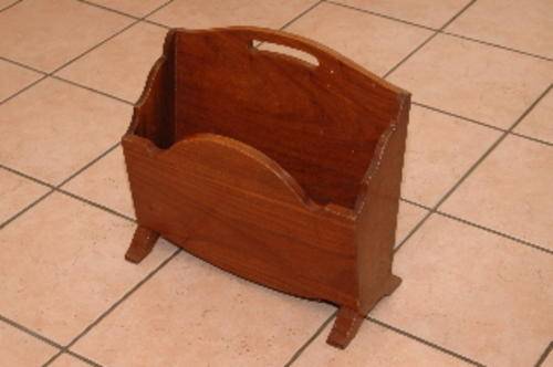 Magazine rack in good condition, width 46cm.  A nice piece.