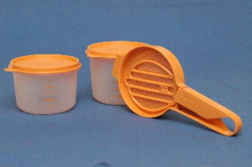 Sift from one container to another. Unused Tupperware.