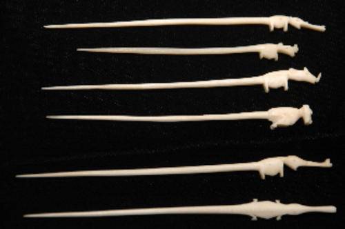 Vintage cocktail sticks, handcarved animals in ? bone?