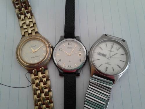 3 Vintage Orient Gent's wrist watches.UNTESTED.MAYBE battery only?Bid 1 taking 3.