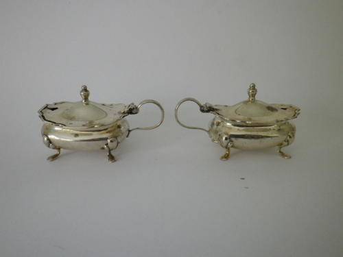 A pair of silver cellars , Birmingham 1902-3 with cobalt  glass linings.