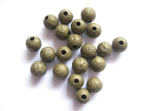 Spacer, round with texture, bronze, 20pcs