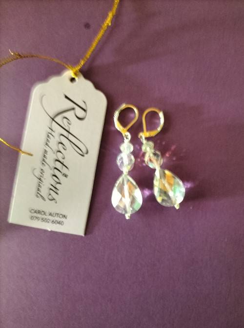 Sterling Silver huggies with large crystal drop. E69