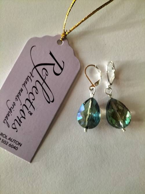 Sterling Slver huggies with beautiful blue/green AB crystal drop. E68