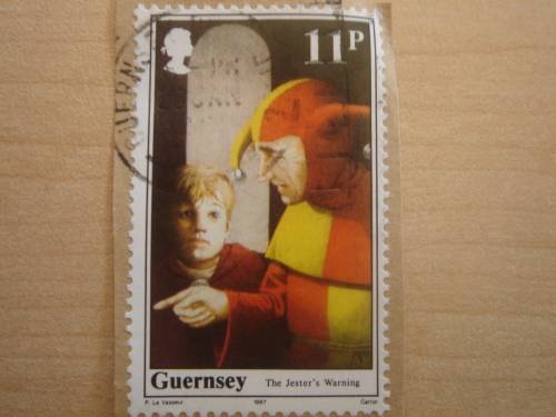 1987 Guernsey postal item with 11 p stamp, The Jester`s Warning
