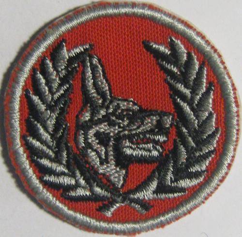 RED BADGE WITH WOLF