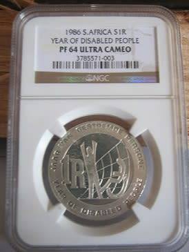 1986 Year of the disabled NGC Graded PF64 Ultra Cameo silver R1