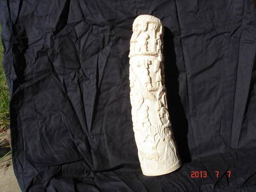 Carved ivory tusk.