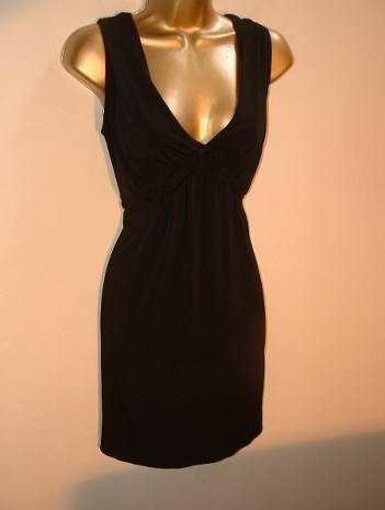 8 - 10 / 32 - 34 new little black dress has stretch stunning !