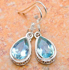 Brand new Solid Sterling Silver drop Earrings with Genuine Blue topaz Gemstones