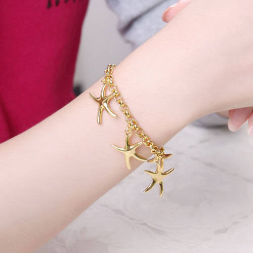 New 18K RGP in Yellow gold, ladies starfish design charm bracelet