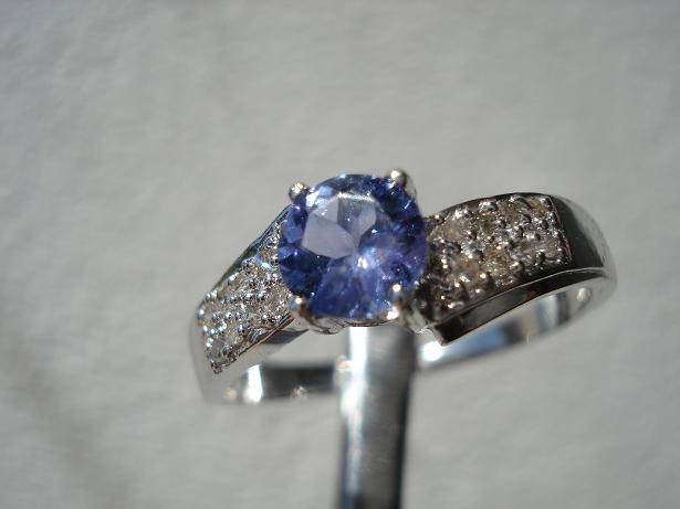 ***R15 000***0.60CT AAA-BLUE COLOUR TANZANITE RING WITH 16 DIAMONDS IN SOLID 14KT WHITE GOLD