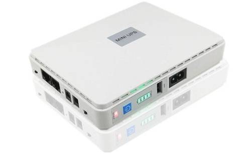 Mini UPS 8800mAh Portable Uninterruptible Power Supply Battery Back-Up. Collections allowed.