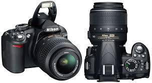 Nikon D3100 14.2MP Digital SLR with 18-55mm + (lowepro adventura 170 bag )