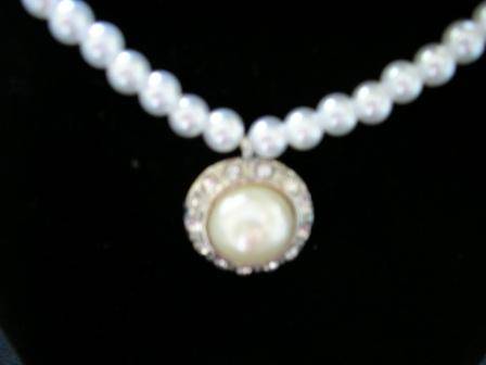 Pearl and diamante pendant on glass pearl necklace