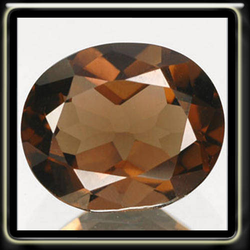 SMOKING 4.15CT SMOKEY BROWN QUARTZ IN A MODERN OVAL POLISHED GEMSTONE