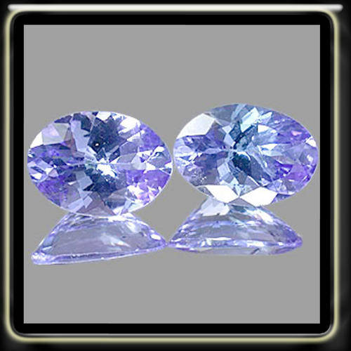 0.32CT SPARKLING PAIR OF NATURAL TANZANITES OVAL LUSTROUS GEMSTONES