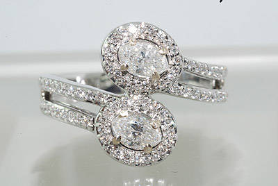 R60000 .96CT MARQUISE & ROUND CUT DIAMOND RING 18K