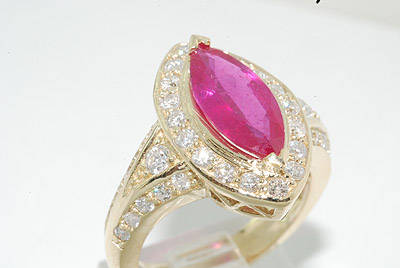 R70000 - RAVISHING 3.95CT MARQUISE CUT RUBY & DIAMOND RING