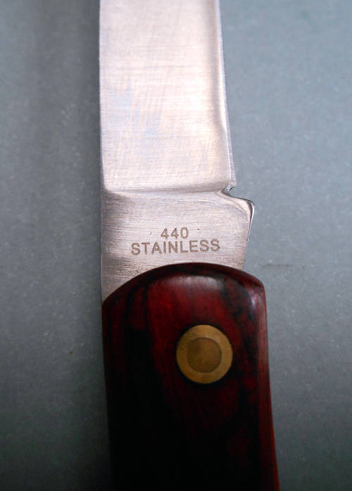 DOW Sodbuster lockback pocket knife wooed scales 440 