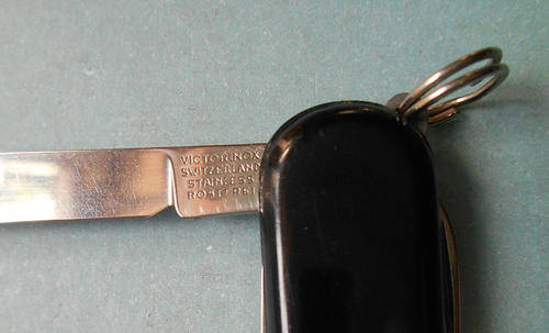A small Victorinox Pocket knife, Black with SAA Logo.
