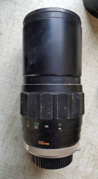 Vintage Minolta XE-1 35mm SLR with five lenses