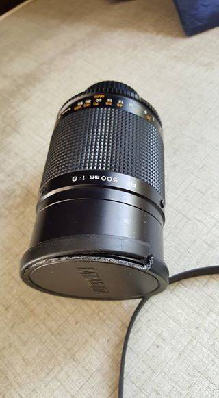 Vintage Minolta XE-1 35mm SLR with five lenses