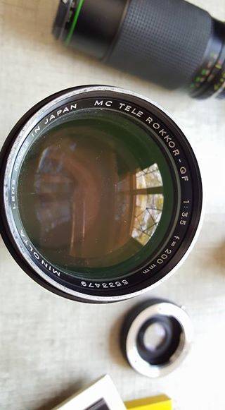 Vintage Minolta XE-1 35mm SLR with five lenses
