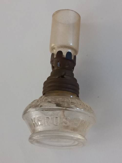 small antique kerosene lamp and glass holder