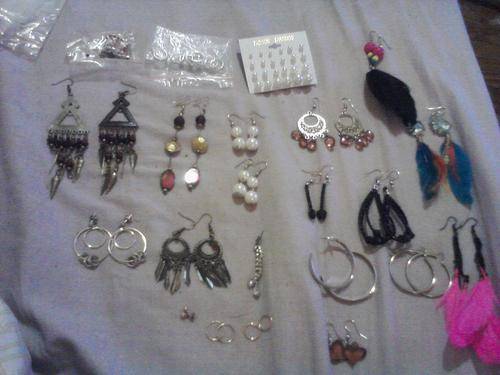 A LOT OF EARINGS