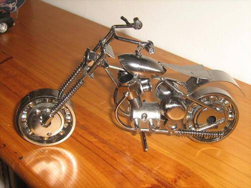 BEAUTIFULL PIECE!! BIKE MADE FROM BOLTS,NUTS,ETC. BRAND NEW AOUT 600G.