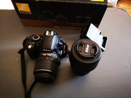 Nikon D3100 + 18-55 mm DX lens original charger and Box only + 6 Months Warranty