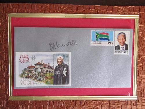 ORIGINAL NELSON MANDELA SIGNATURE ON SPECIAL SILVER ORDER OF ST. JOHN ENVELOPE