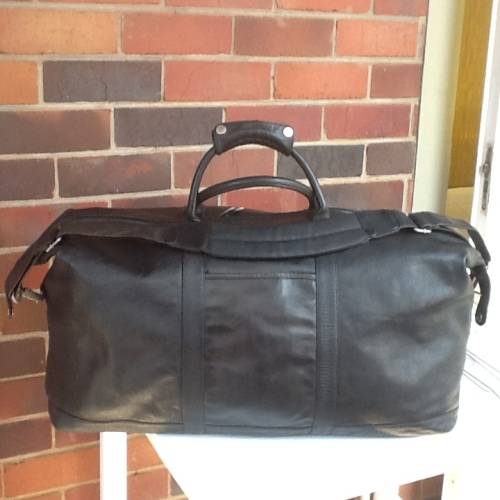 A Beautiful Black Leather Holdall.